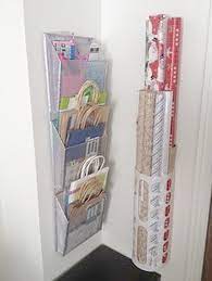 25 Simple Ways To Tackle The Messiest Chore Of The Holidays Craft Room Organization Gift Wrap Organization Craft Room