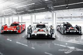 The 2015 Spec Porsche 919 Hybrid In Three Colors For Le Mans Wec Photos Main Gallery Motorsport Com Le Mans Porsche Gt Cars