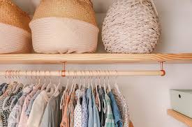You just need to make sure you position the rod at the best height and distance from the wall. Diy Floating Wood Shelves Clothing Bar In Honor Of Design