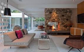 When you enter the area, you are going to find the living room arranged on the right side of the door. 30 Stone Fireplace Ideas For A Cozy Nature Inspired Home Mid Century Modern House Mid Century Modern Interiors Mid Century Modern Living Room