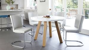 White is an easy colour to match, and looks especially good with modern, glossy dining sets, as well as more classic, rustic looks such as a wooden farmhouse table. Arc 4 Seater White Gloss And Oak Dining Table Oak Dining Sets Round Dining Table Sets Oak Dining Table