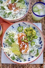 Spread tartar on tortilla, add cheese, add fish, top with cole slaw, Fish Taco Bowls With Cilantro Lime Rice Freutcake
