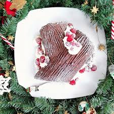 This Chocolate Yule Log Or Buche De Noel Is A Flourless Chocolate Cake Rolled Up With Cranberry Raspberry Mascarpone Fillin Chocolate Yule Log Yule Christmas