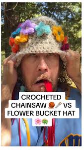 Who wins? Crocheted Chainsaw 🧶⛓️🪚VS Pretty Floral Bucket Hat 👒 It was a  Crochet-Off for the ages. #crochet #buckethat #chainsaw #crochetcommunity  #comedyreels