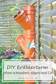 Erdbeerturm Selber Bauen In Nur 4 Schritten Zur Diy Erdbeersaule Erdbeerturm Erdbeeren Und Erdbeeren Pflanzen Balkon