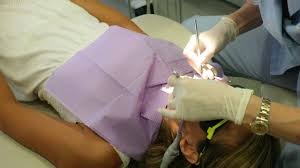 Getting your wisdom teeth out is something that is known as a necessary evil. How To Reduce Swelling After Wisdom Teeth Removal Kyrene Dentistry Blog