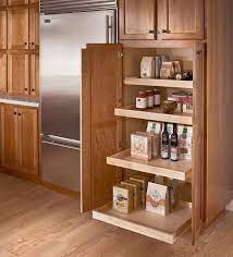 This perception often sees blind corner cabinets overlooked in kitchen designs…but if you use your blind corner cabinets wisely and pair them with the appropriate accessories you. Kraftmaid Corner Cabinet Roll Out Tray Browse Kraftmaid Kitchen Storage Solut Kitchen Cabinet Storage Kraftmaid Kitchen Cabinets Freestanding Kitchen Storage