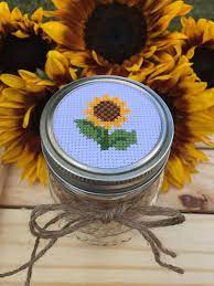 A color printer works best for this, so you can easily wall hangings, pillows, toys and placemats are just a few of the many projects you can make with free cross stitch patterns. Sunflower Mason Jar Mason Jar Decor Cross Stitch Mason Jar Etsy Cross Stitch Sunflower Wedding Cross Stitch Mason Jar Decorations