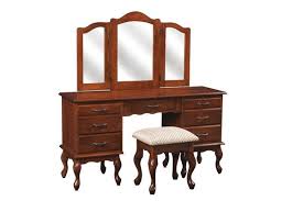 A low table or chest of drawers with a mirror at which one sits while dressing, applying makeup or similar tasks. Queen Anne Vanity Dressing Table From Dutchcrafters Amish Furniture