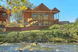 130 log cabins scattered throughout pigeon forge, with a few in gatlinburg and sevierville. A River Retreat 3 Bedroom Luxury Cabin Near Gatlinburg With Private Pool