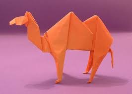 Camels have an unmistakable silhouette, with their humped back, short tail, long, slim legs, and a neck that dips downward and rises to a small, narrow camels efficiently adapted to the harsh conditions of their habitat; Origami Camels Gilad S Origami Page Cute Origami Origami Paper Crafts Origami