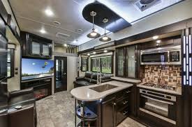 Road Warrior Is Lifestyle Fun Travel Off Road And Leisure Heartlandrvs Roadwarrior Toyhauler Fifthwheel Rv Rving Rv Luxury Rv Rv Interior Rv Living