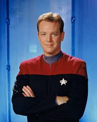 What was the in-universe explanation for Tom Paris looking exactly like  Nick Locarno in “Star Trek: Voyager?”