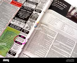 Classified car newspaper hi-res stock ...
