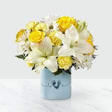 Welcoming a new baby bundle of joy into the world is an exciting event that is a definite cause for celebration. Ftd Tiny Miracle Baby Boy Ashland Addison Florist Co