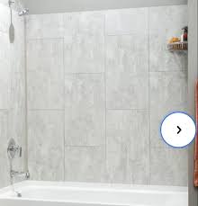 .gray tile, white tile, mosaic tile, dark hardwood floors, an undermount sink, open cabinets, light wood cabinets, an alcove tub, grey walls and marble inspiration for a country bathroom in orange county with an alcove tub, a shower/bathtub combo, white tile, white walls, an undermount sink, black floor. Do I Need To Cut The Bottom Row Of Tiles For A Shower Wall To Keep Them Level Home Improvement Stack Exchange