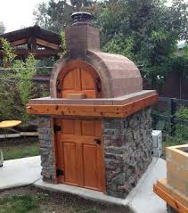 One Of Our Fellow Washingtonians Created This Awesome Wood Fired Pizza Oven And La Caja Style Pig Roaster Bbq Diy Pizza Oven Pizza Oven Pizza Oven Outdoor
