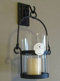 Wrought iron candle jar holders sconces will add rustic style to any room and enable the easy. Pin On Sconses
