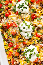 You Can Make This Easy Beef Taco Casserole With Tortilla Chips Or Doritos It S Perfect For A Fun Weeknight Dinner Recipes Taco Casserole Easy Taco Casserole