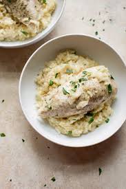 Add all ingredients to instant pot in the order in which they are listed, except for sour cream, cheese, frozen veggies and parsley, pushing rice underneath the liquid as much as possible. Instant Pot Chicken And Rice Salt Lavender