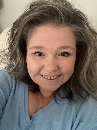 Should women over 50 keep their big hair or change their hairstyle?