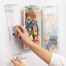 This comic book channel is focused on comic book reviews, new comic book day, graded comic books, cgc unboxings how to display comic books on walls without damage today i'm going to show you how you can display your comics on your. Amazon Com Comic Mount Comic Book Frame Wall Mount And Shelf Stand Invisible And Adjustable 1 Pack Frames
