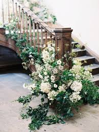 Floral Staircase Installation By The Garden Gate Flower Company Wedding Staircase Wedding Flowers Wedding Stairs