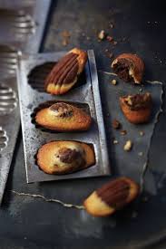 Une Recette De Madeleines Au Chocolat Qui Ravira Petits Et Grands A L Heure Du Gouter Recette Madeleine Recette Recettes De Cuisine