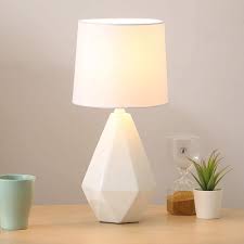 It comes equipped with a usb seated in the base for use to charge mobile phones, handheld games, tablets, and other small electronics. Sottae Modern Small Ceramic Table Lamp White Irregular Geometric Bedside Desk Lamp For Living Room Bedrooms Nightstand Lamps With White Fabric Shade Amazon Com