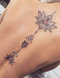 Magnifique Et Lotus Meaningful Tattoos Vous Aurez Instantanement L Amour Spine Tattoos For Women Tattoos For Women Feminine Back Tattoos