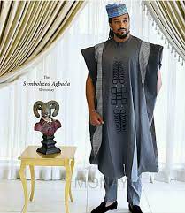 He worked a classic white shirt and white trousers and the agbada design consist of blue embroidery on. Top 35 Agbada Challenge Styles 2021 Yoruba Demons Reny Styles