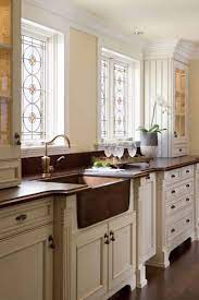 Think white cabinets above the sink paired with shades of blue, black, or brown below. 35 Fresh White Kitchen Cabinets Ideas To Brighten Your Space Home Remodeling Contractors Sebring Design Build
