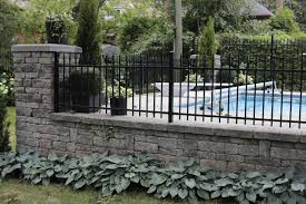 Wrought iron fences in toronto, mississauga, brampton, milton and oakville fortify your property. Field Stone Wall With Ornamental Iron Fence Modern Landscape Toronto By Heritage Stoneworks Ltd Houzz