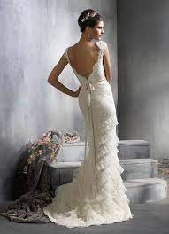 Backless, open back and low back wedding dresses to make a statement sometimes a little drama on your wedding day is a good thing. Wedding Dresses Wedding Gowns Evening Dresses Bridesmaid Dresses And Designer Wedding Dresses Wedding Dresses Lace Ivory Lace Wedding Dress