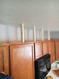 Learn How To Easily Add Height To Your Kitchen Cabinets Kitchen Cabinet Inspiration Above Kitchen Cabinets Diy Kitchen Cabinets