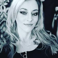 Where is the best place in Martinsville to get piercings, preferably a  tattoo parlor?