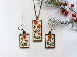 This dried flower jewelry tutorial will teach you how to create a beautiful pressed flower pendant with the look of resin without the hassle. Pressed Flower Jewelry Set Botanical Jewelry Dried Flower Etsy