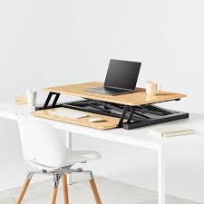 The vivo sit stand converter ($100) is one of the most economical and with a little effort can transition from sitting to standing height in one smooth motion. Cooper Standing Desk Converter For Flexible Use Fully