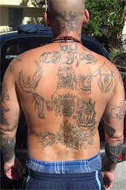 The crips have a lot of tattoos associated with them, with a portion of them having to do with disrespecting their rival gang, the bloods. Gang Signal Public Enemies