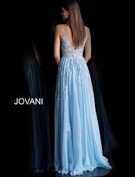 Sleeveless long prom gown features an embellished bodice and a flare skirt with tulle overlay. Jovani 58632 Light Blue Floral Embroidered Prom Dress