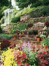 Beautiful English Garden The Most Beautiful Howevere Joycie S Rain Forest Is The Most Enchanting Garden I Sloped Garden Beautiful Gardens Hillside Landscaping