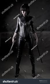 Photo de stock Photo dune femme assassine sexy avec 602064518 |  Shutterstock