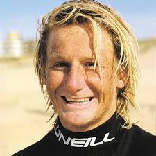 Tributes have poured for a talented Gold Coast surfer, footballer and 'a  bloody champion man', who died in a shark attack. 😥😥 Read more:  https://bit.ly/4fIzEfT