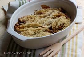 Preparazione dell'indivia belga al forno. Indivia Belga Gratinata Cucina Veloce E Sana