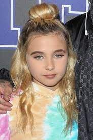 Travis barker let his daughter cover up his face tattoos with this viral tiktok product. Alabama Barker S Hairstyles Hair Colors Steal Her Style