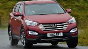 The high center console's soft leather surface offers the comfort of an armchair, while the. Hyundai Santa Fe Auto Express