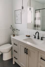 Creating a white bathroom means coordinating bathroom fixtures and tile. Cozy Modern Black And White Bathroom Remodel Lemon Thistle