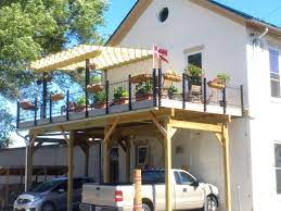 Carport Deck On Converted Fire House In Dayton Ohio Updating House Carport Scandinavian Houses