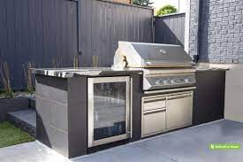 Stainless steel model price includes $300 savings. Outdoor Cooking Is Made Easy With This Custom Bbq Station Beautifully Clad In Charcoal Porcel Outdoor Kitchen Appliances Outdoor Kitchen Outdoor Kitchen Design