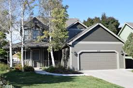 In this example, the brick and the vertical siding get two slightly different shades of cool gray. Popular Exterior House Colors In Greeley Co